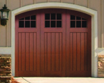 We have vinyl garage doors that look like wood.