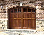 Wood garage doors can be finished to perfectly match the exterior of your home